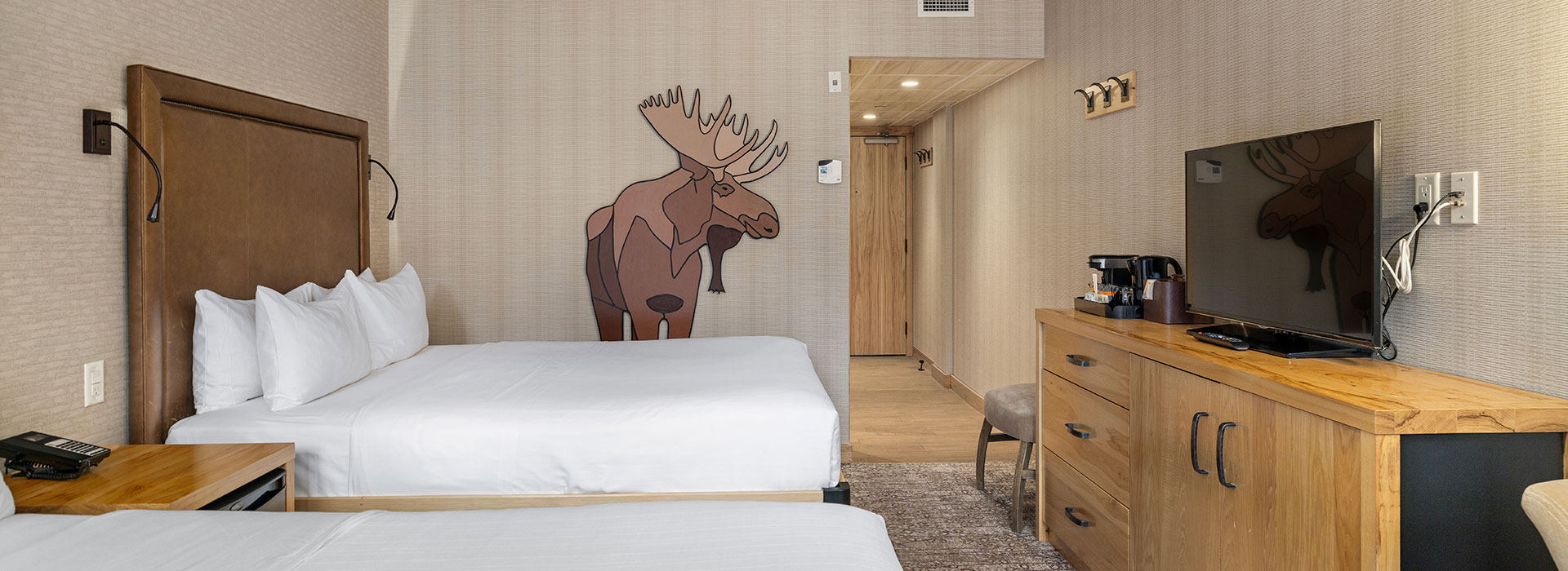 Accessible hotel room with two queen beds