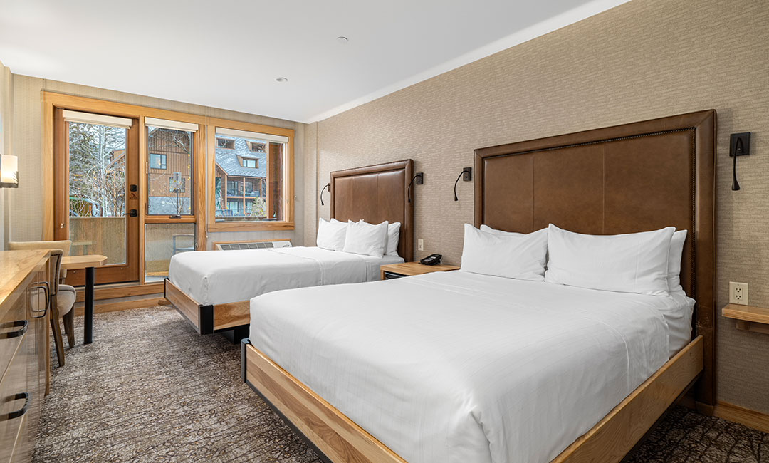 Accessible hotel room with two queen beds
